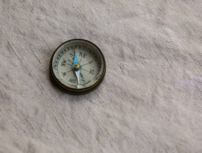 Compass on a cloth background